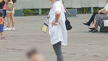 Photo of alleged Chinese tourist allowing child to defecate or pee at SM MOA area draws ire of netizens