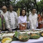Department of Tourism (DOT) Secretary Christina Garcia Frasco (middle) joins (from left to right) DOT Undersecretary Myra Paz Abubakar, Ambassador Abdul Malik Melvin Castelino Anthony of the Embassy of Malaysia, and Ambassador Tull Traisorat of the Royal Embassy of Thailand, National Commission for Culture and Arts Executive Director Oscar Caysasay in a traditional Filipino salo-salo lunch at the launch of Philippine Eatsperience in Luneta Park.