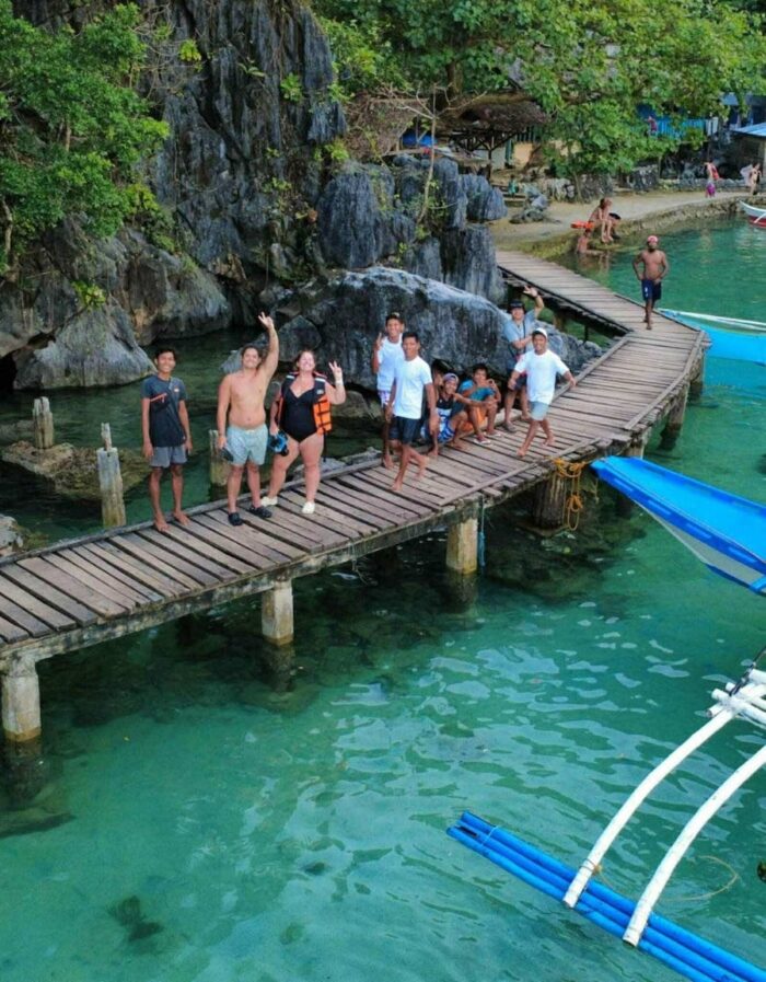 Local and foreign tourists cool off in the clear waters of Kayangan Lake in Coron, Palawan.