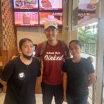Robi Domingo with staff