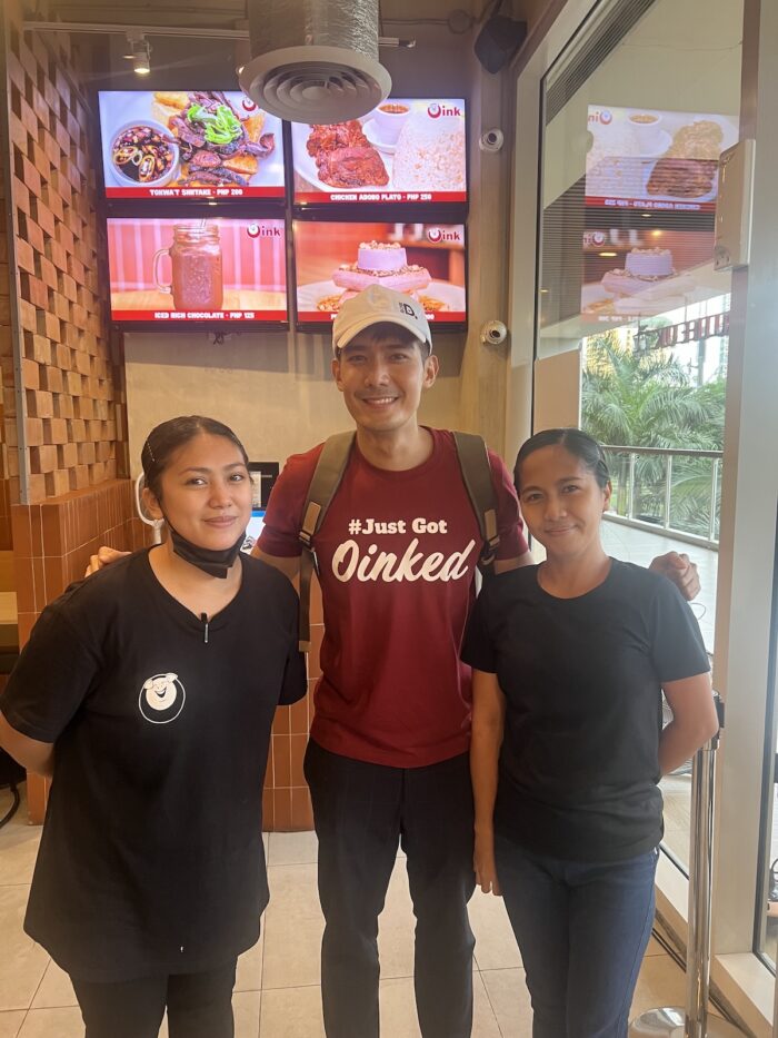 Robi Domingo with staff